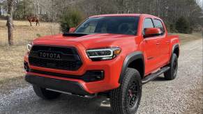 The 2023 Toyota Tacoma TRD Pro off-roading on a gravel path