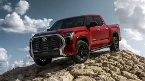 The 2023 Toyota Tundra climbing over rocks