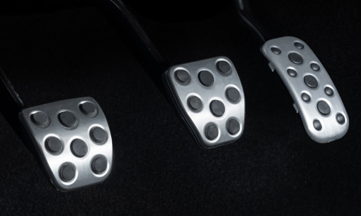 Closeup of the clutch pedal in a Toyota Tacoma 4WD pickup truck.