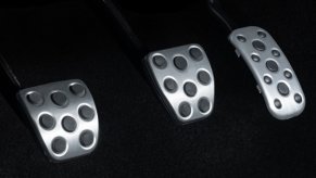 Closeup of the clutch pedal in a Toyota Tacoma 4WD pickup truck.