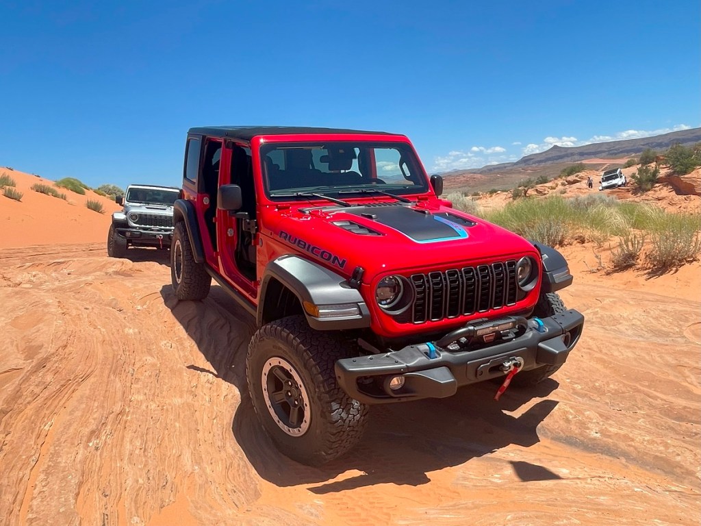The 2024 Jeep Wrangler 4xe off-roading in the desert 
