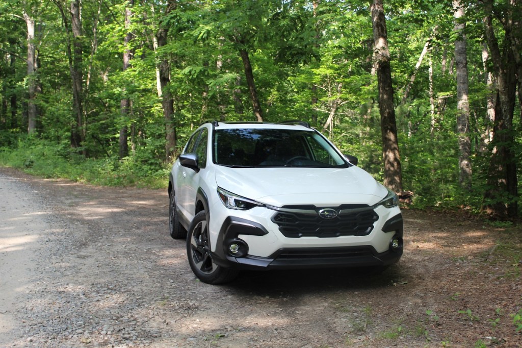 The 2024 Subaru Crosstrek off-roading in the woods