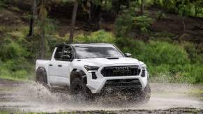 The 2024 Toyota Tacoma Hybrid fording water
