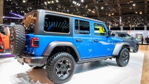 The not affordable Jeep Wrangler Rubicon Plug-in Hybrid in blue off road vehicle at Brussels Expo