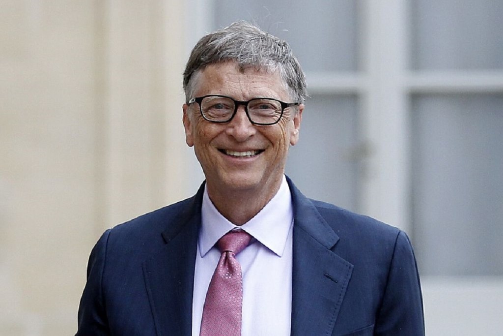 Bill Gates, one of the richest billionaires in the world, smiles before getting in a car.