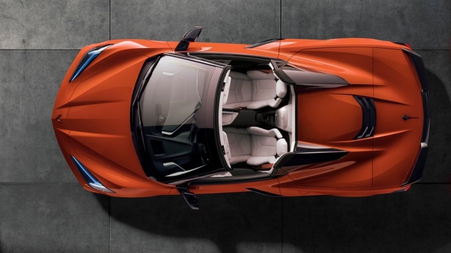 An orange Chevrolet Corvette shows off its drop-top.