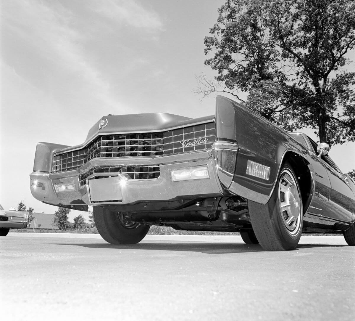 A black and white photo of a Cadillac Eldorado FWD model with an egg-crate grille from the 1967 Chevrolet lineup