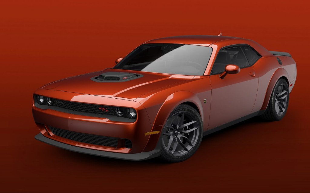 A Dodge Challenger R/T Scat Pack Widebody displays its flared fenders. 