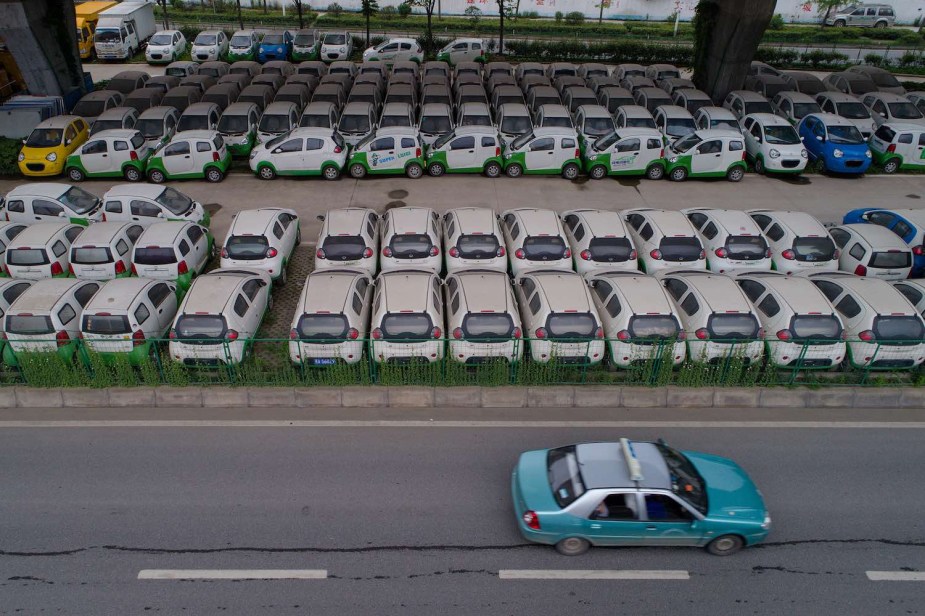 Rows of abandoned EVs resulting from a government push for electric vehicles in China.