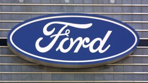 The Ford blue oval logo once again adorns one of the buildings at the Ford Motor Company's world headquarters