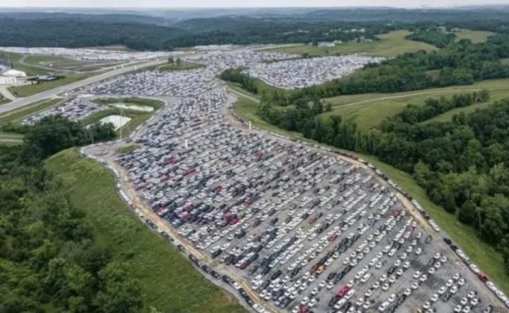 Overhead view of 2023 Ford F-150 models in storage lots
