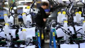 Motor vehicle brake vacuum servo components on a Ford Motor Company factory assembly line in Cologne, Germany