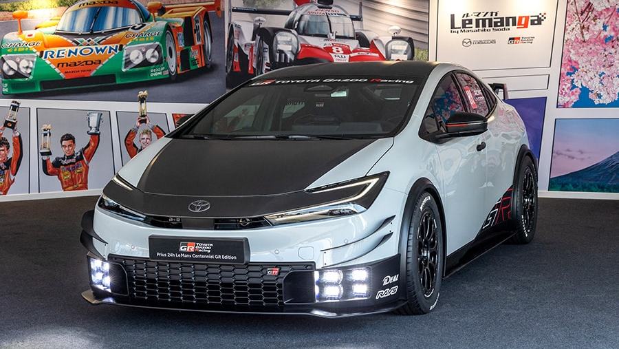 A photo of the front of the Toyota GR Prius Le Mans concept, featuring a quartet of LED foglights flanking the car's honeycomb grille.