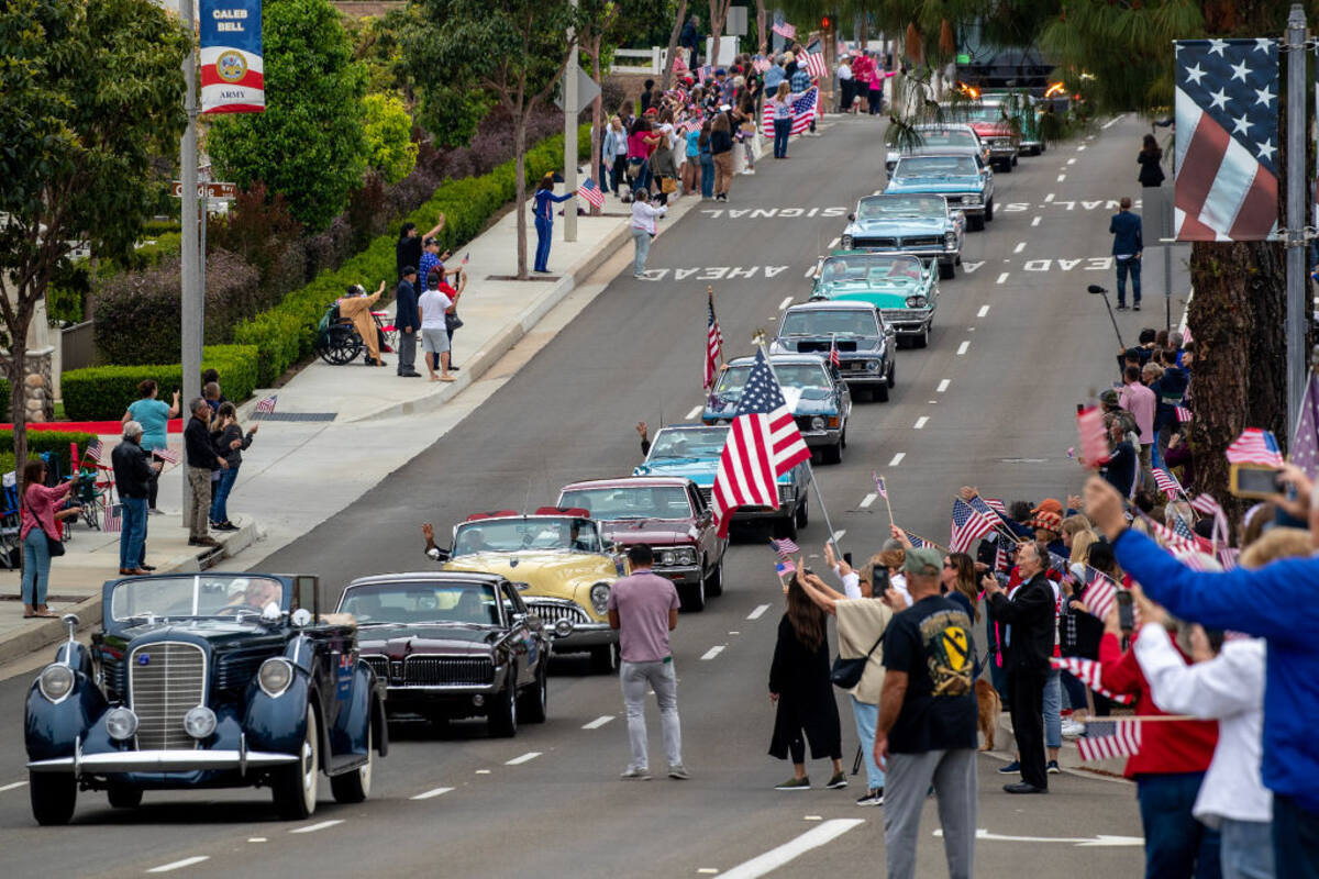 Classic car parade similar to what you'd find at the Sarasota Classic Car Museum