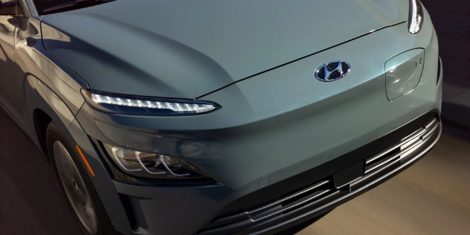 The front of a gray Hyundai Kona Electric. 