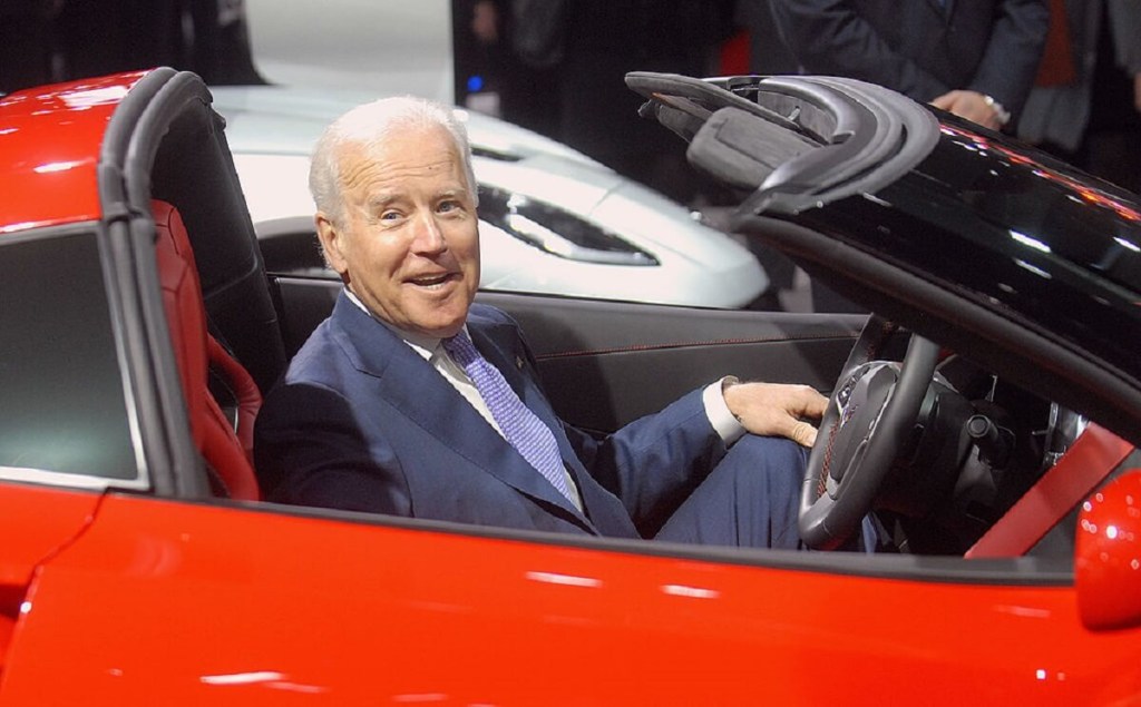 U.S. President Joe Biden smiles a big as he can at the prospect of going for a drive in a C7 Corvette. 