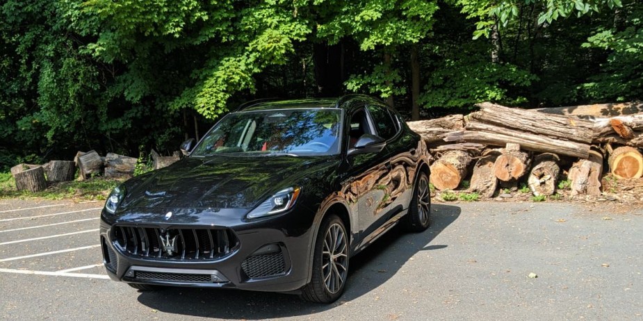 A black 2023 Maserati Grecale small SUV is parked outdoors. 