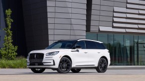 Of Lincoln sales in 2023, the new 2023 Lincoln Corsair (in white in front of a building) is on the decline while the Navigator is rising.