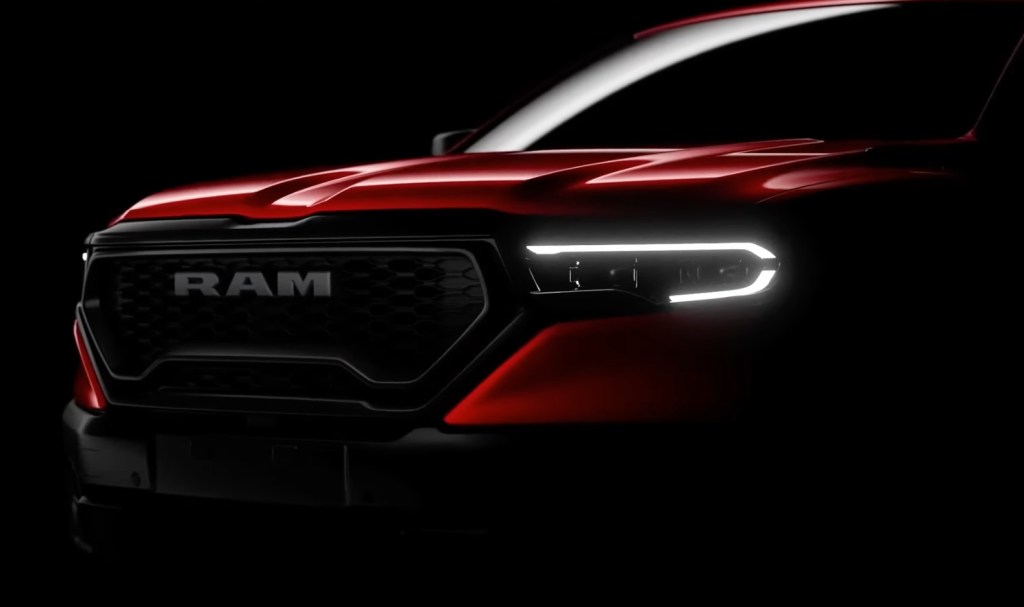 The new Ram Rampage grille teaser image in low light shows a new Ram pickup truck.