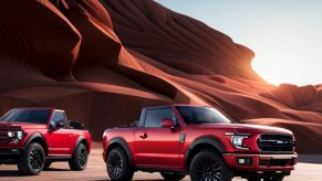 A rendering of two red Ford Bronco convertibles sitting in the desert.