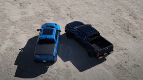Bird's eye view of a Ram 1500 and Toyota Tundra Limited parked side-by-side.