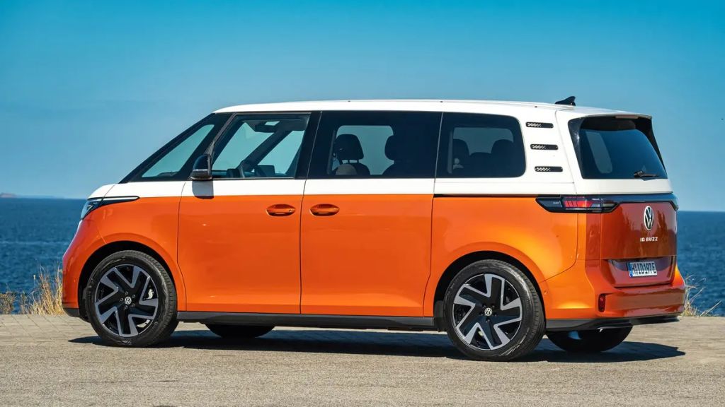orange model VW van 2025 id.Buzz EV side