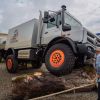 A customized Mercedes-Benz Unimog U5030 at an off-road fair in Bad Kissingen, Germany