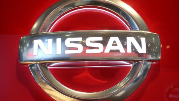 An illuminated Nissan corporate logo at the European Motor Show launched by Prince Philip of Belgium