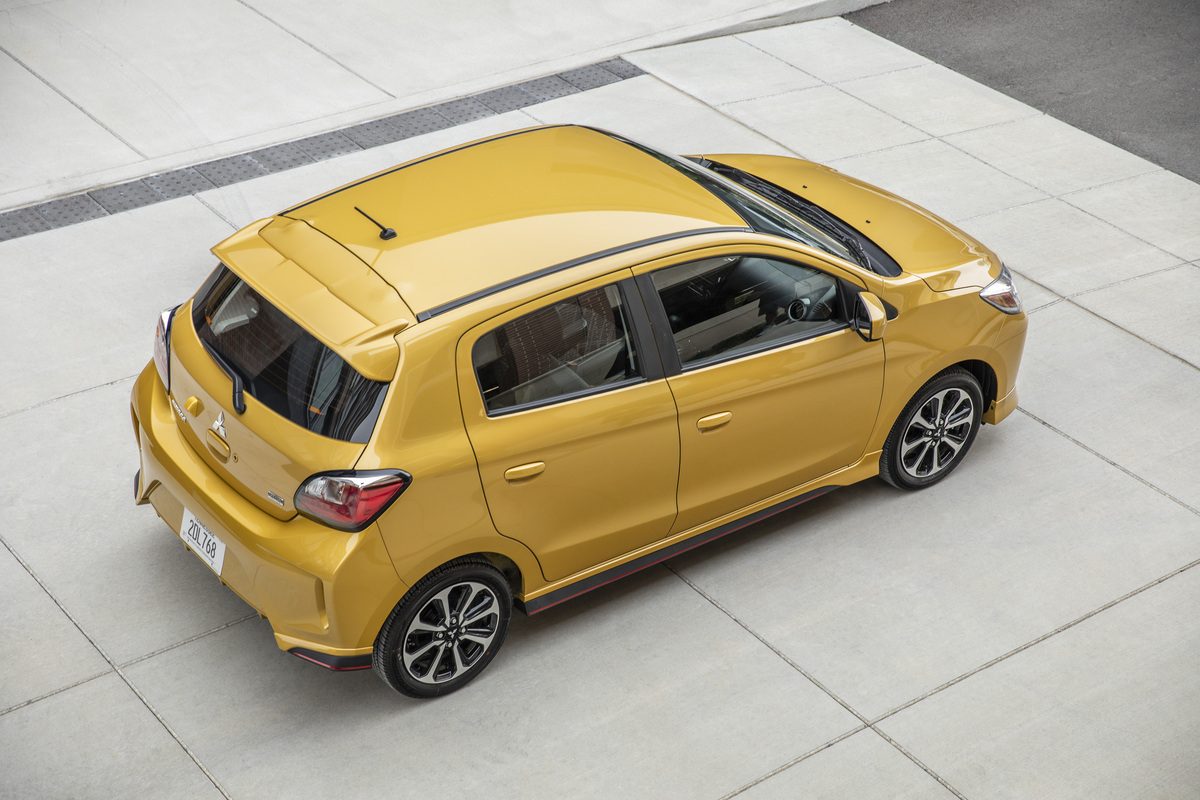 2022 Mitsubishi Mirage yellow 5-door hatchback top view rear 3/4 is the cheapest brand new car you can buy