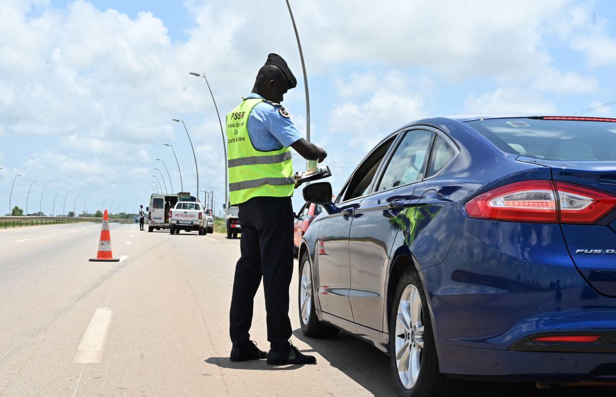 A police checkpoint for driver's license near Grand Bassam in Abidjan, Côte d’Ivoire, West Africa