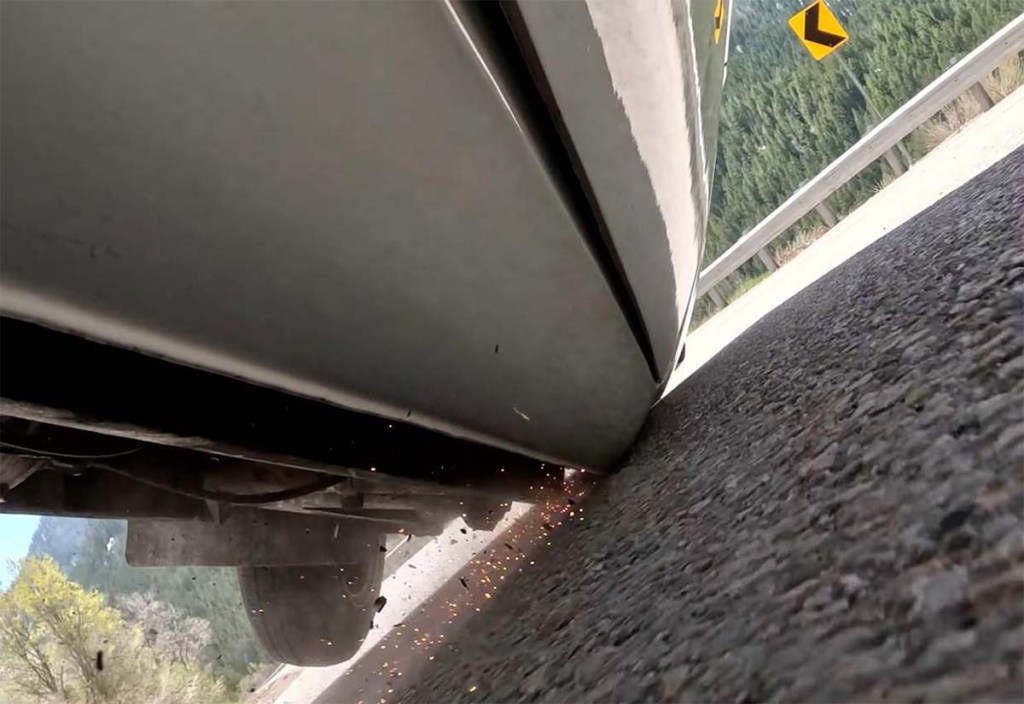 White Reliant Robin tipping over during a turn during Donut testing of Top Gear incident