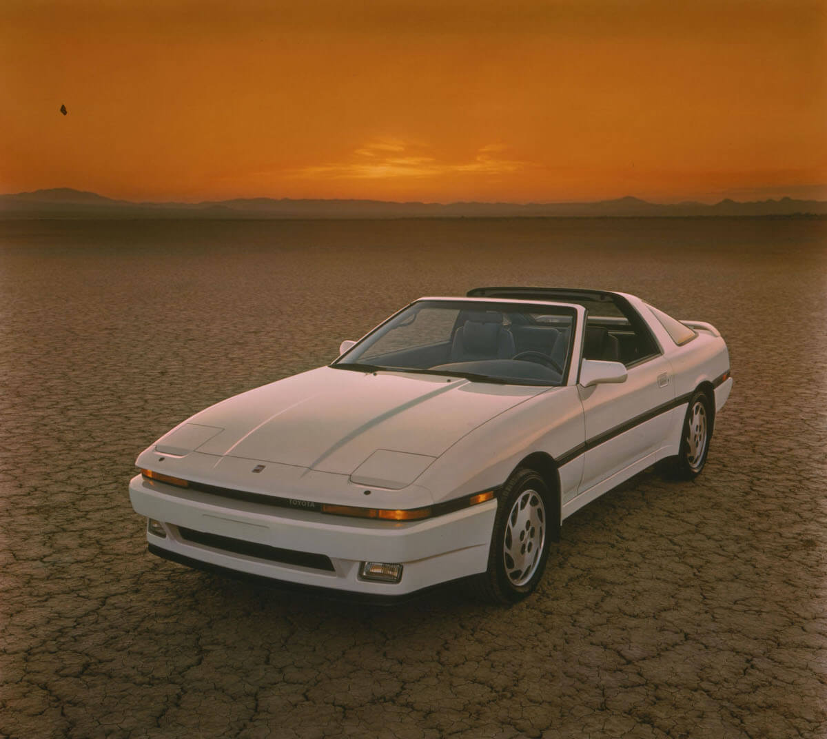 A front view of a white 1987 Toyota Supra
