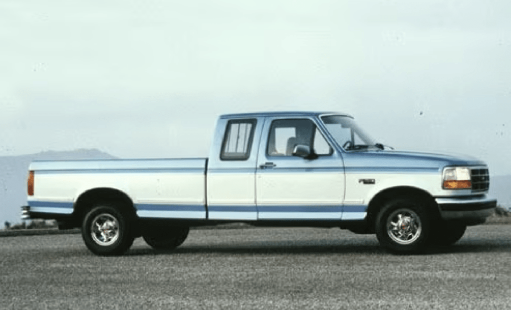 Blue and white 1993 Ford F-150, the last generation with this body style.