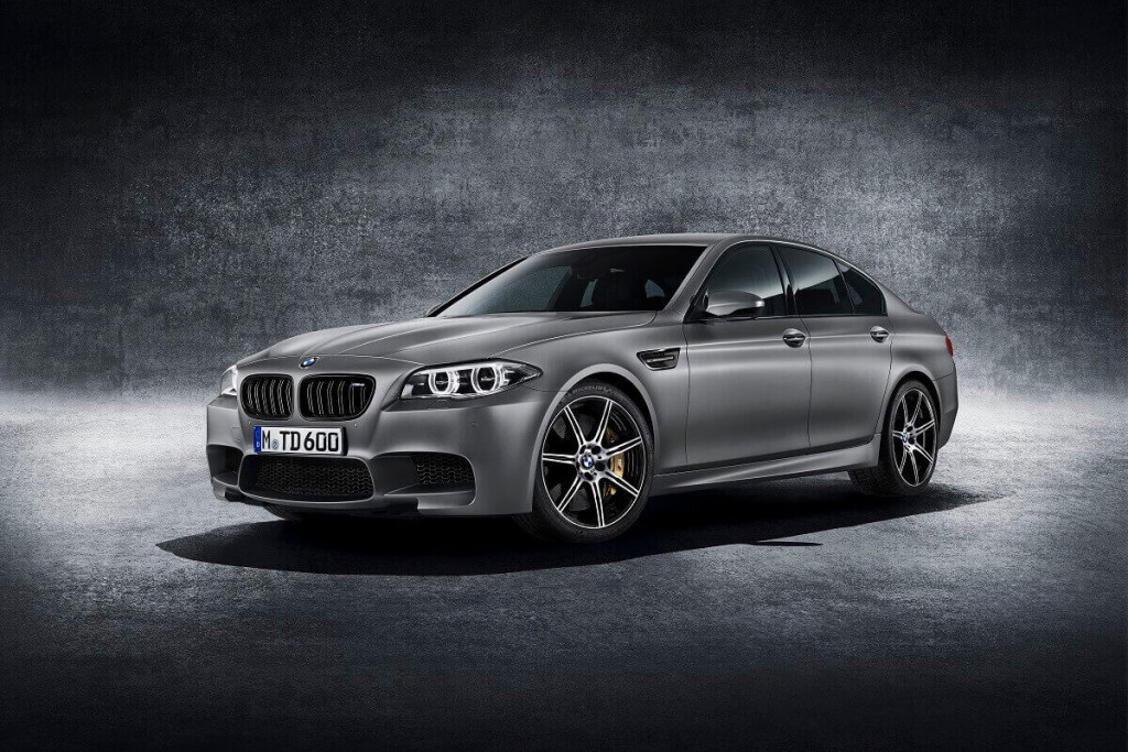 A 2015 BMW M5 shows off its subtle fast sleeper car styling and anniversary livery.