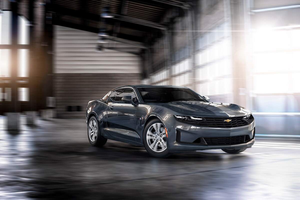 Front angle view of gray 2023 Chevy Camaro, the cheapest new sports car, which GM and Chevrolet are killing
