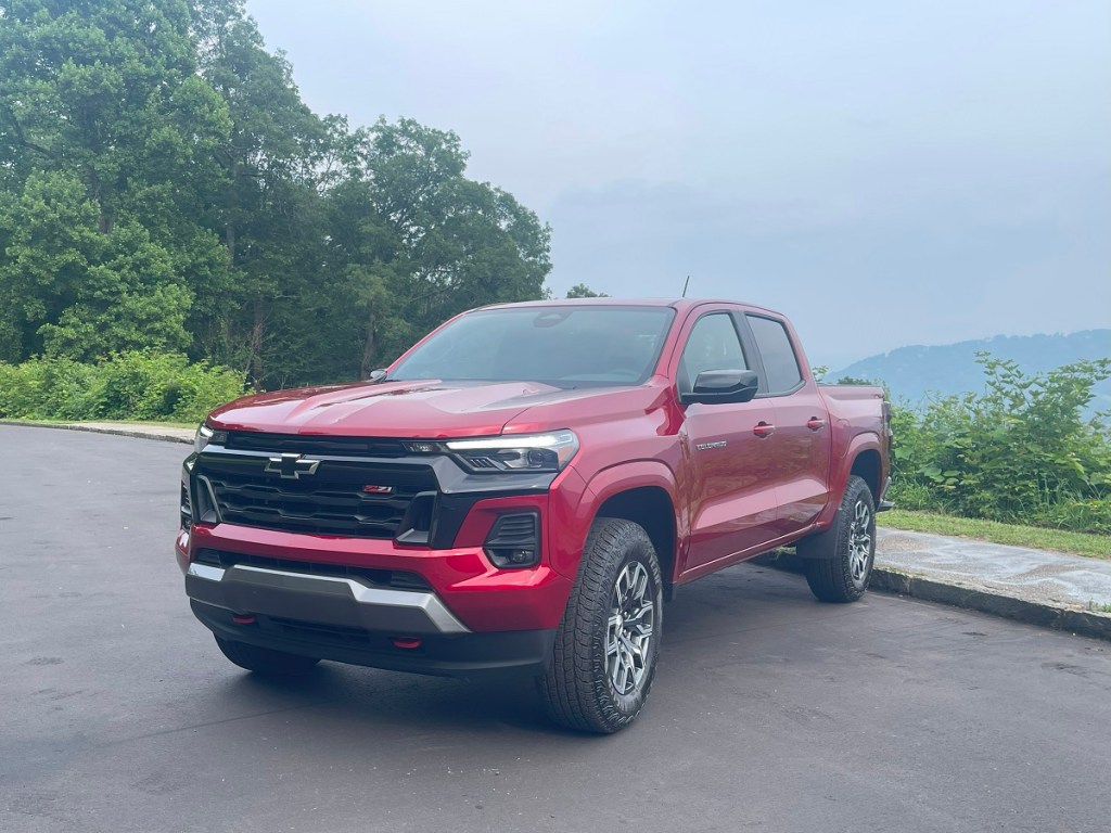 The 2023 Chevy Colorado Z71parked near a mountain view on a hazy day 