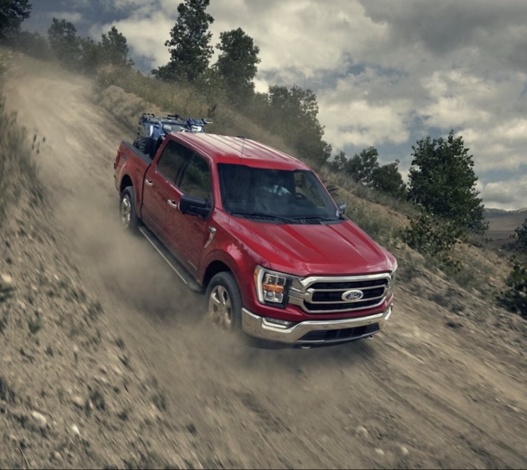 2023 Ford F-150 off-roading on a dirt trail