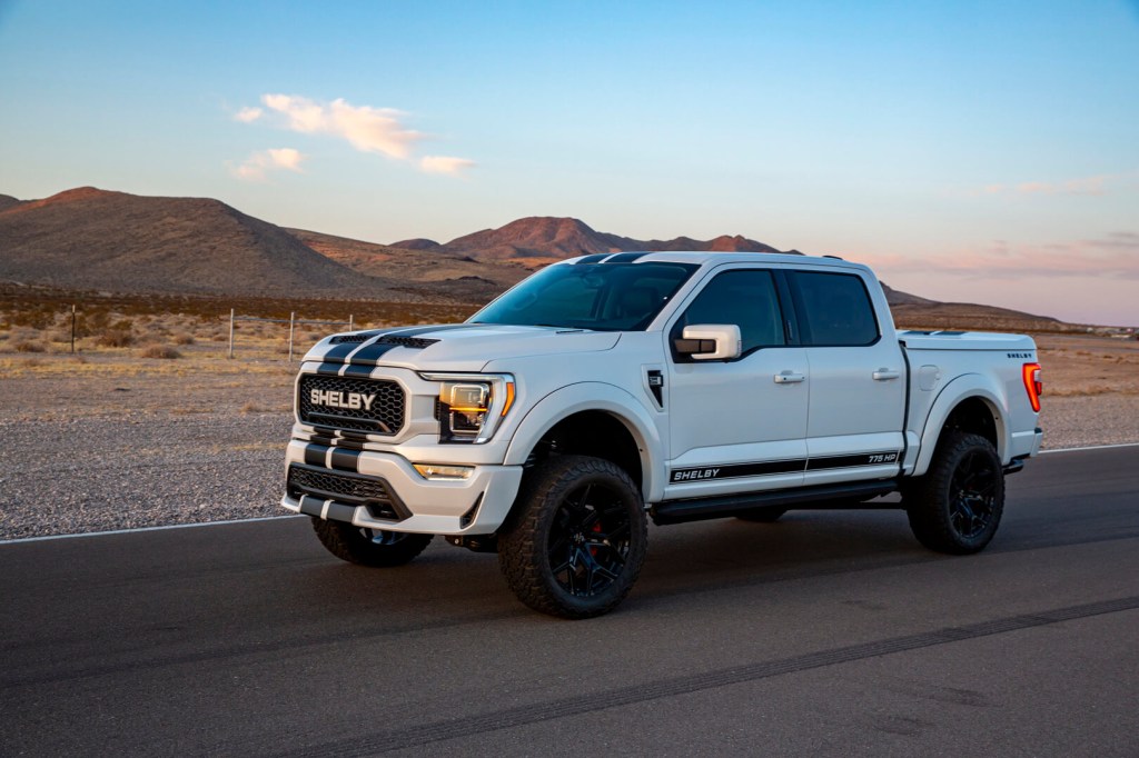 The 2023 Ford F-150 Shelby driving down the road