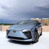 A frontal view of the 2023 Lexus RZ on a parking structure