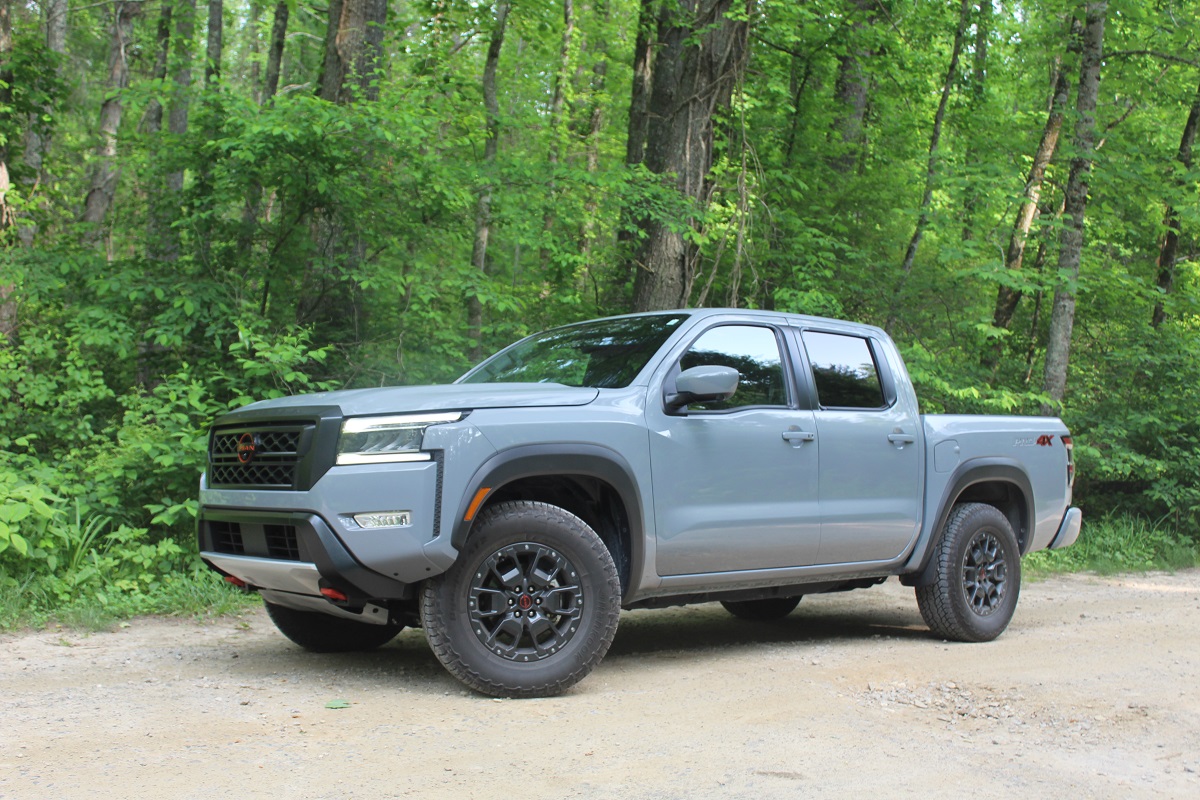 The 2023 Nissan Frontier off-roading in the woods