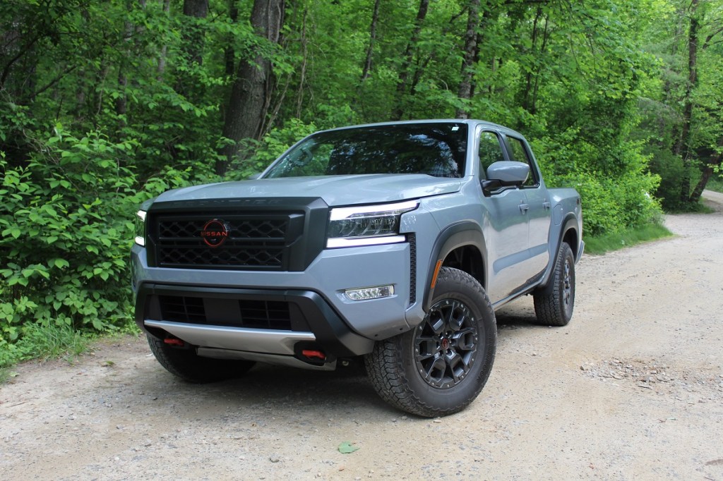 The 2023 Nissan Frontier Pro-4X off-roading in the woods