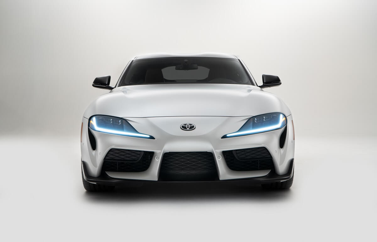 A white 2023 Toyota GR Supra 3.0 shows off its front-end styling.