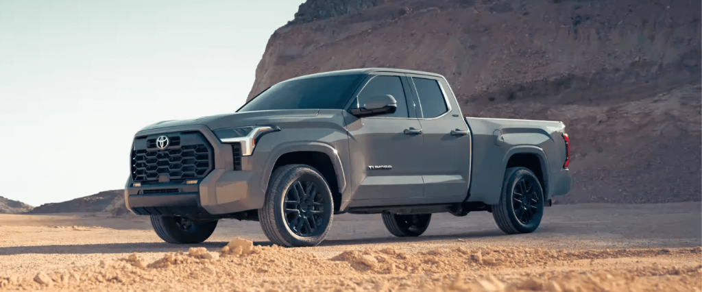 The 2023 Toyota Tundra parked in the desert sand