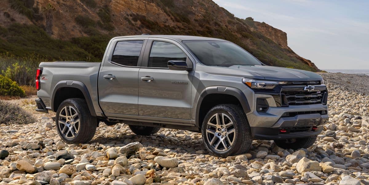 The 2023 Chevy Colorado off-roading over rocky terrain