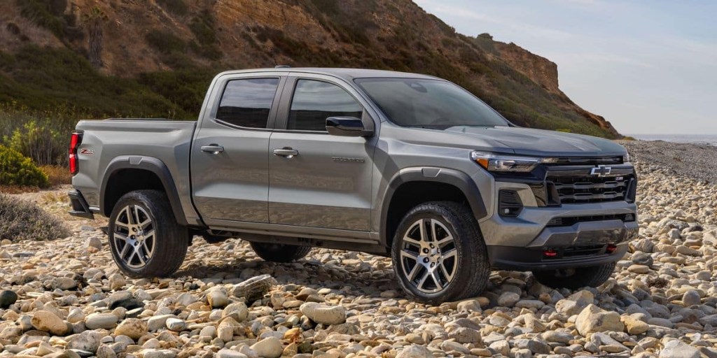 The 2023 Chevy Colorado off-roading over rocky terrain
