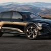 A dark-colored 2024 Audi SQ8 e-tron all-electric midsize luxury SUV model