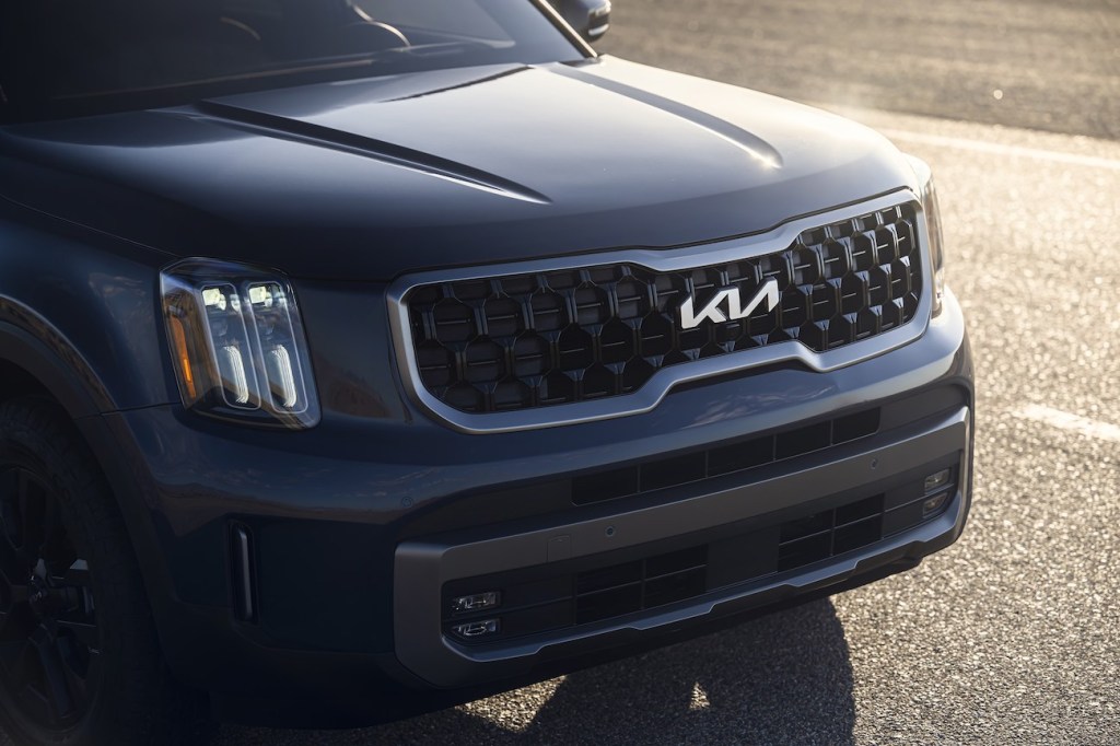 The front grille of the 2024 Kia Telluride on the road. The 2024 Kia Telluride price at the highest trim level can get up there.
