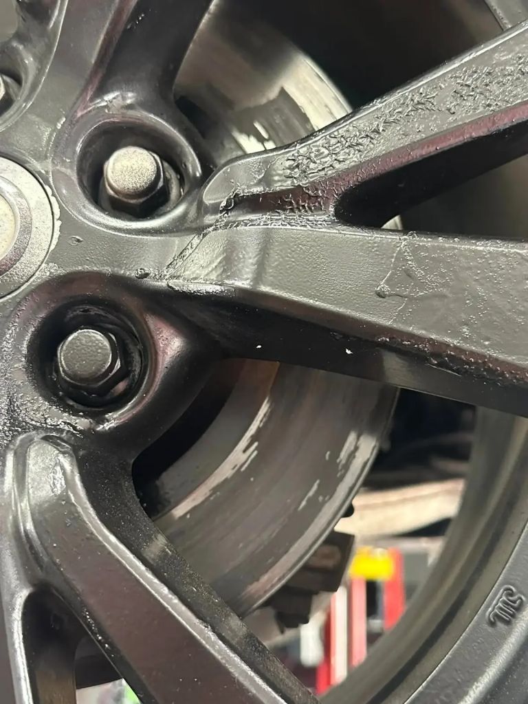 Painted disc brake rotors with paint stuck to them