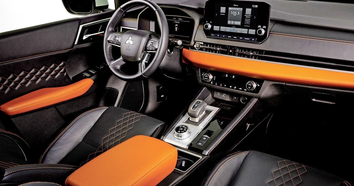 2023 Mitsubishi Outlander interior in orange and black