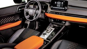 2023 Mitsubishi Outlander interior in orange and black